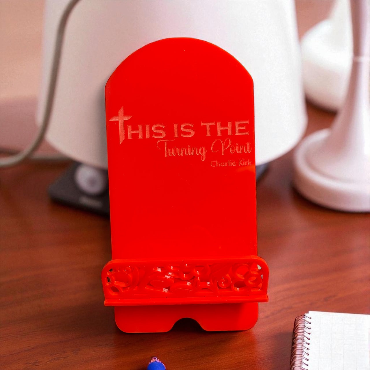 Turning Point Phone Stand
